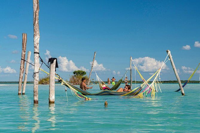 1 Day Tour to Bacalar, Cenotes and 7 color Lagoon with lunch from Cancun - Lake of the Seven Colors by pontoon: pirates channel, changing blues, and birdwatch vibes