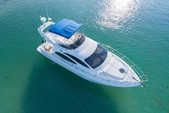 4H 42' Azimut Yacht All-Inclusive from Tulum & Playa del Carmen. - Where You Meet: Riviera Elite at Puerto Aventuras