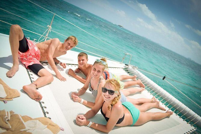 Afternoon Half-Day Catmaran Sailing and Snorkel Adventure - Life onboard: snacks, sodas, tequila, and music