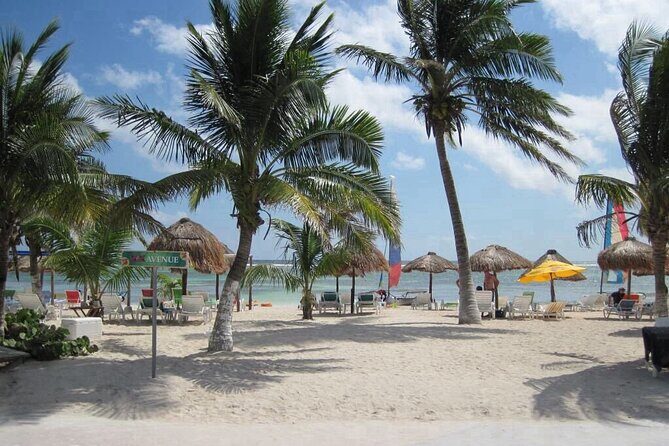All-Inclusive Costa Maya Beach Break - Shade and seating at the beach: palapas, umbrellas, and the real reason you’re booking