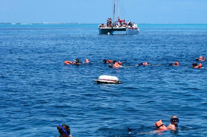 Amazing tour to the beauty Isla Mujeres with Snorkel and open bar - Spinnaker and weather: the part that can change your day