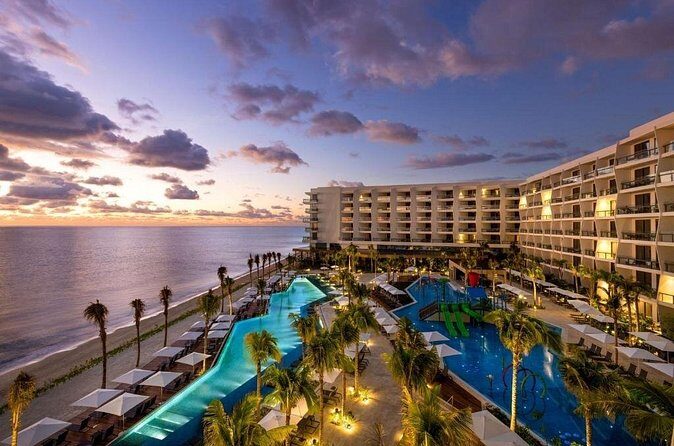 Cancun Airport and Hilton Cancun Mar Caribe Private Shuttle - Drop-Off at the Hilton Cancun Entrance (With Luggage Help)