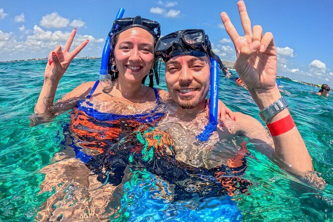 Cancun Catamaran: Isla Mujeres, Snorkeling, Drinks & Buffet Lunch - Isla Mujeres Time: Playa Norte and the Beach-Club Lunch Stop
