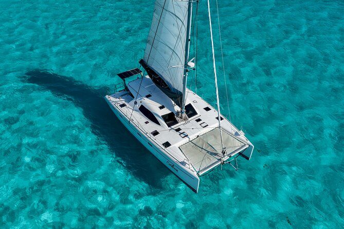Cancún Catamaran to Isla Mujeres + Snorkel, Open Bar & Lunch - Price and the Real Cost: USD 55 Plus One Extra Fee