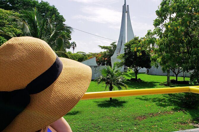 Cancun City Tour by Downtown and Turistic Hightlights on Open Bus - Playa Delfines: Sea Views, Quick Photos, and Weather Reality