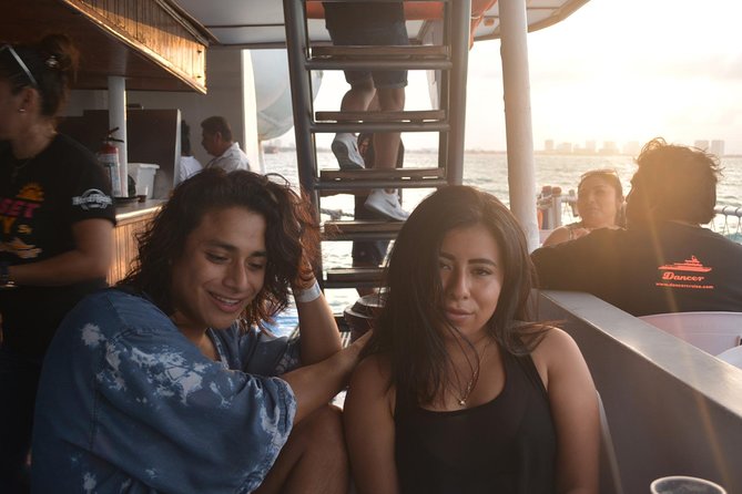 Cancun Dancer Cruise to Isla Mujeres with Snorkeling and Lunch - Boat water fun: slide, diving board, and deck time