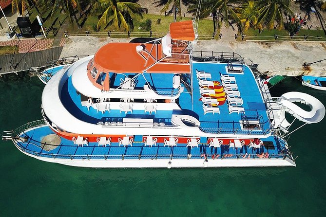 Cancun Dancer Cruise to Isla Mujeres with Snorkeling and Lunch - Morning on the catamaran: breakfast, music, and getting oriented