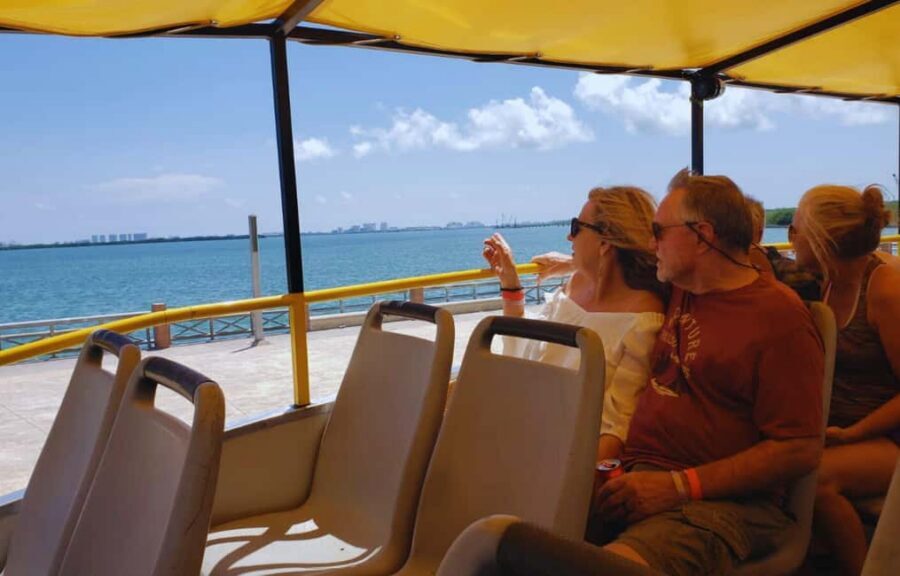 Cancun: Guided City Tour with Shopping by Double Decker Bus - Downtown highlights and Hotel Zone time from the double-decker bus
