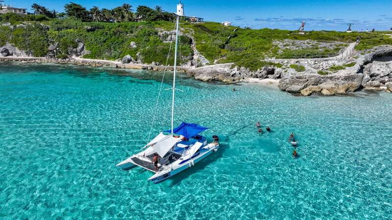 Cancun: Half Day Private Catamaran to Isla Mujeres - Stepping aboard: what a small private boat feels like at sea
