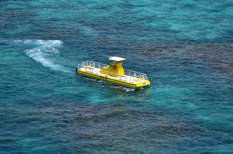 Cancún: Hop-on Hop-off Bus Tour with Submarine Trip - Your Downtown flavor: markets, parks, and Nichupté views