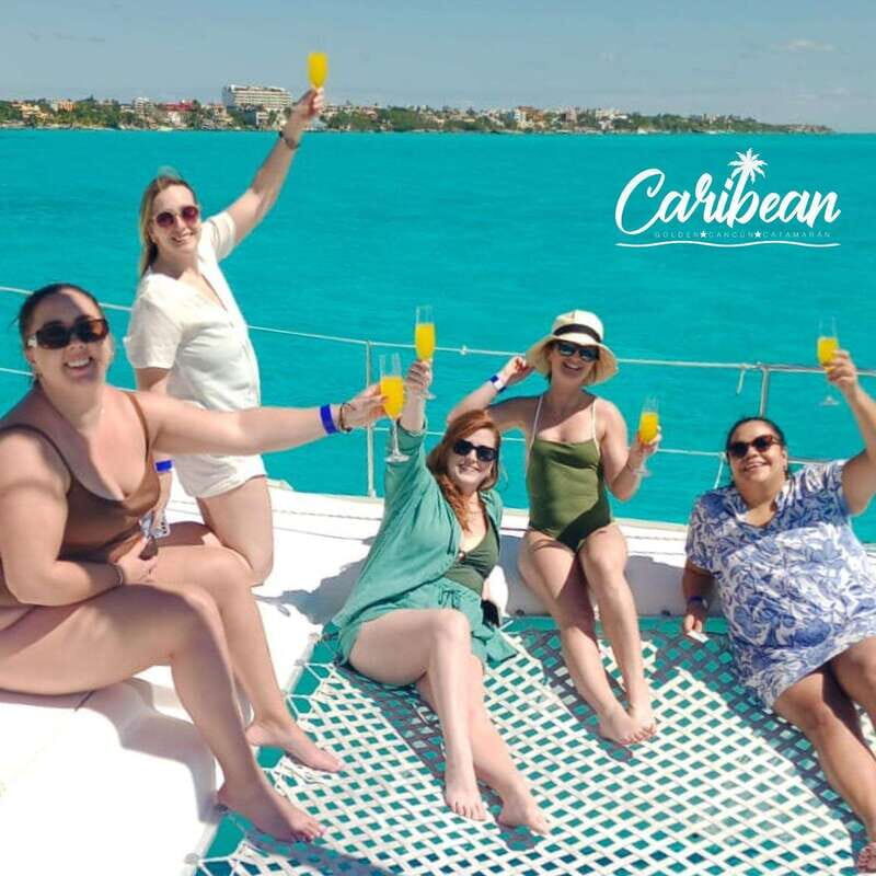 Cancun: Isla Mujeres Catamaran + Coco Bongo Show - Catamaran Return and the Sunset Piña Colada Moment