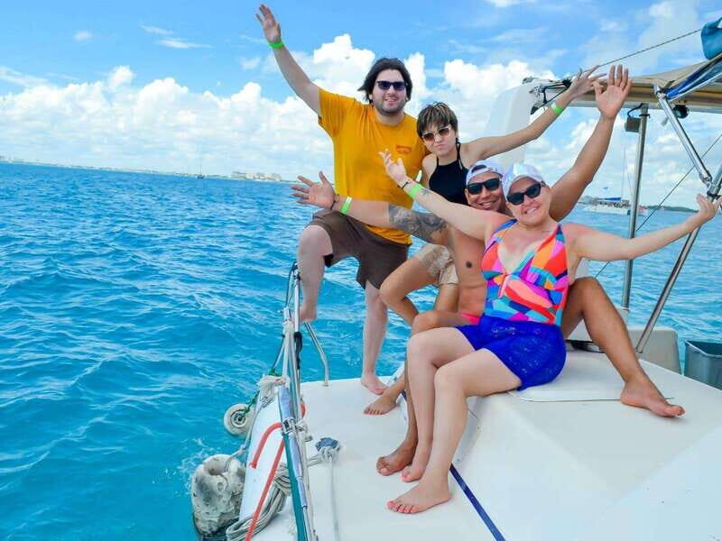 Cancun: Isla Mujeres Catamaran Tour with Open Bar of Drinks - From Marina Las Perlas to the Catamaran: Your 8-Hour Island Rhythm