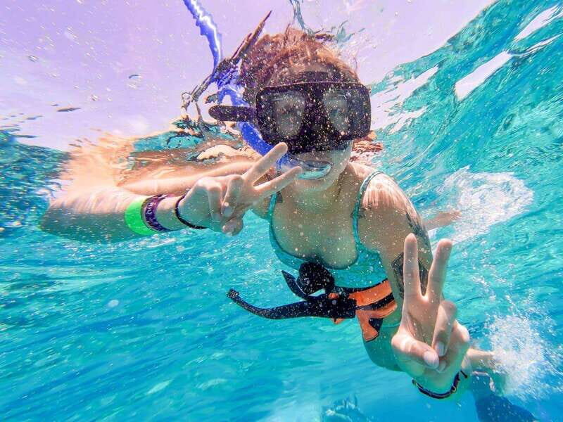 Cancun: Isla Mujeres Catamaran Tour with Open Bar of Drinks - Snorkeling the Caribbean Reef (When the Sea Co-operates)