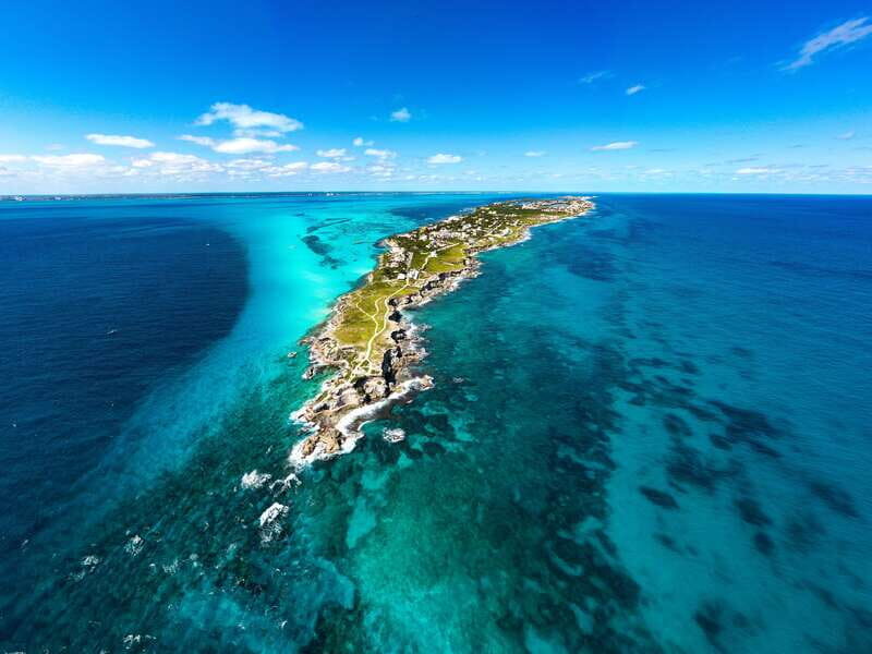 Cancun: Isla Mujeres Premium Catamaran Half-Day Tour - Cancun to Isla Mujeres in 5 hours: the vibe you’re buying