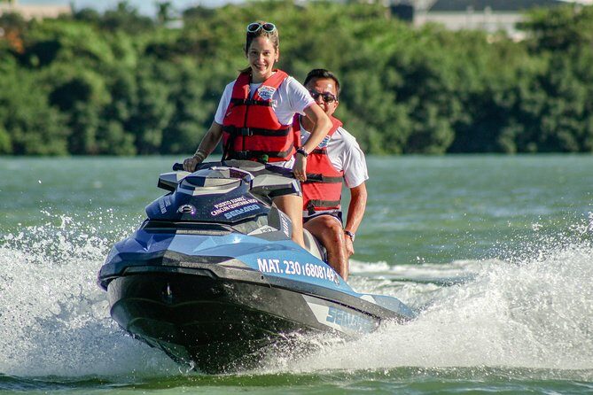 Cancun Mangrove Jet Ski Tour: 2 riders per jet ski - La Isla stop: Passing the mall from the water