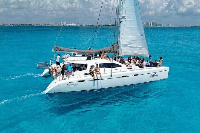 Cancun: Private Catamaran with Open Bar & Snorkeling Option - Isla Mujeres on the 7-hour option: calm beach time and a buffet lunch