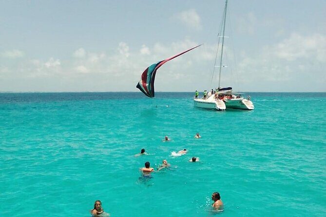 Cancun Sailing Catamaran Islas Mujeres With Luxury Beach Club - Beach Club Down Time: Pool, Shade, and Lunch