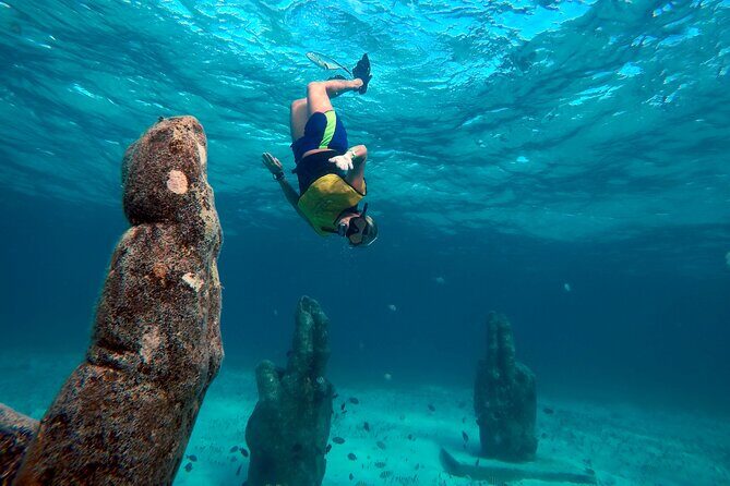 Cancun Snorkeling Adventure: Underwater Museum, Reef & Shipwreck - Shipwreck swim: a natural pool feel with white sand
