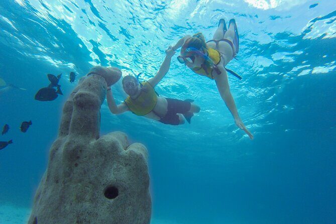Cancun Snorkeling Tour: Swim with Turtles, Reef, Underwater Museum and Shipwreck - Stop 1 at MUSA: snorkeling the underwater museum exhibits