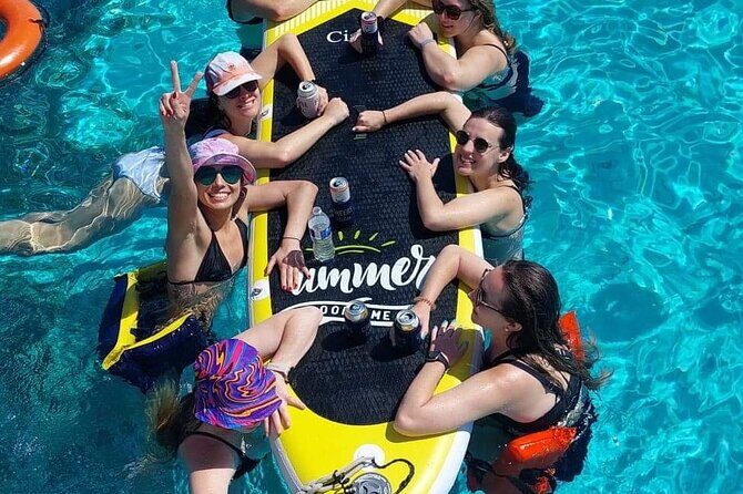 Cancun to Isla Mujeres Private Catamaran Cruising Snorkeling Fun! - South-coast cruising, sightseeing, and anchor swimming at Playa Norte