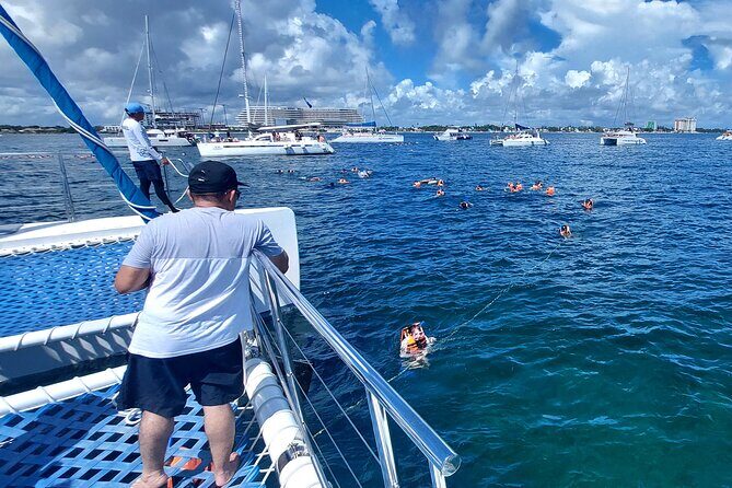 Catamaran Adventure Isla Mujeres with Snorkeling and Beach Club - Amazona Beach Club: Lunch, Shade, and an Open Bar