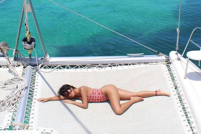 Catamaran adventure to Isla Mujeres with Snorkel,Buffet,Open Bar and Beach Club - From Cancun Marina to Isla Mujeres: The Start of Your Sea Day