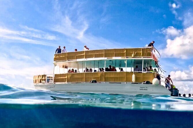 Catamaran Excursion + Open bar + Snorkeling at El Cielo - El Cielito Beach: Shallow Water, Music, and the In-Water Bar