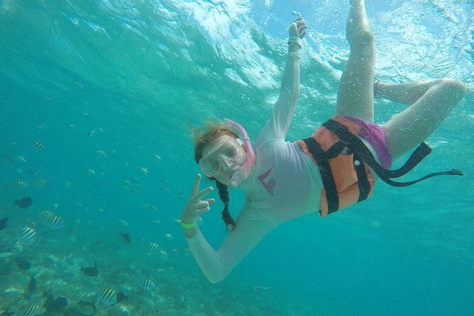 Catamaran Group Sightseeing, Snorkeling Tour Isla Mujeres - Stop 1: El Meco Reef Park and the Submarine Museum Sculptures