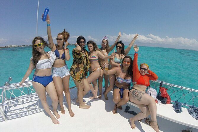 Catamaran Party Boat Cancun - The catamaran party vibe: DJ, music, and the open-bar rhythm