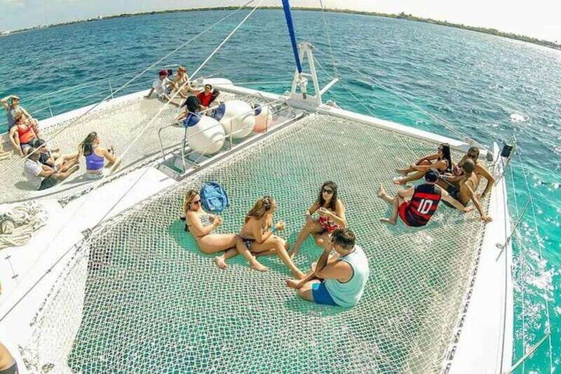 Catamaran party Isla Mujeres with drinks & lunch - The 7-Hour Flow From Hotel Pickup to Cancun Marina