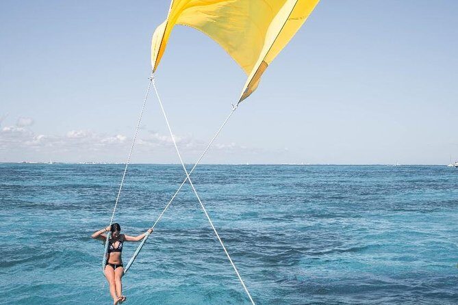 Catamaran Sail to Isla Mujeres with all inclusive from Cancun or Riviera Maya - Open bar + music: fun factor (with a smart drink plan)