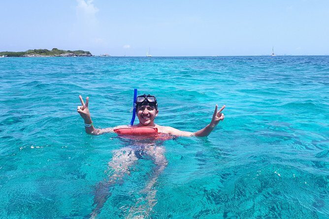 Catamaran Sailing and Snorkeling to Isla Mujeres from Cancun - Isla Mujeres Beach Club: Lunch, Sun, and a Real Place to Unwind