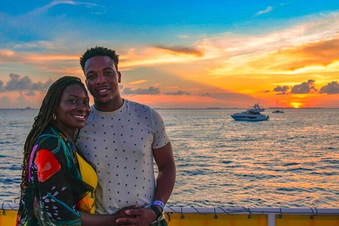 Catamaran Sunset Cruise to Isla Mujeres from Cancun - Onboard vibe: sax music, crew energy, and a party-cruise feel