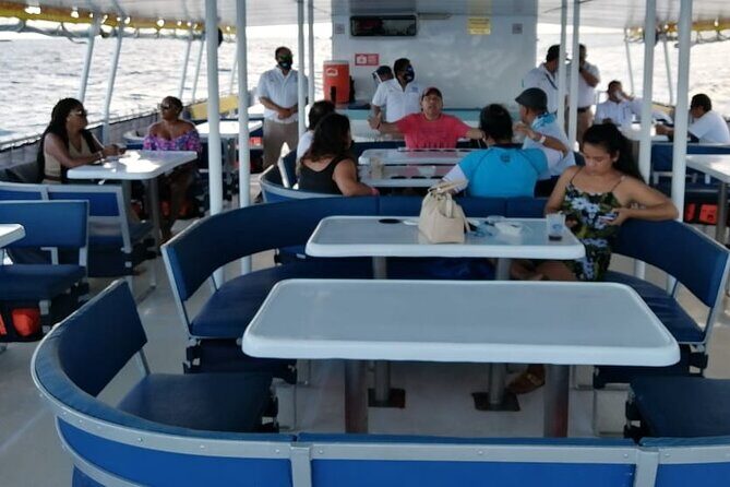 Catamaran to Isla Mujeres at sunset pick up Cancun - Stop 2 and Stop 3 at Isla Mujeres + Playa Norte Sunset Return