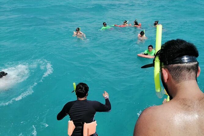 Catamaran to Isla Mujeres at sunset pick up Cancun - The Real Deal on Group Size and Party Energy