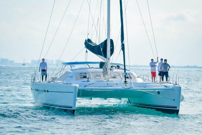 Catamaran to Isla Mujeres – Kids Go Free! (Only Pay Dock Fee) - The Return Trip Party: Music, Drinks, and a Timing Trap