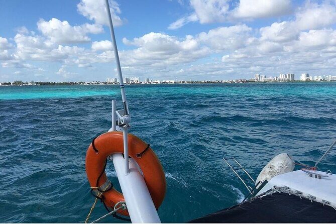 Catamaran to Isla Mujeres, Open bar, buffet, Beach Club Included - Spinnaker: Included, Optional, and Weather-Dependent