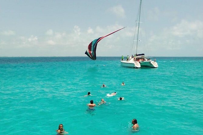 Catamaran to Isla Mujeres, Open bar, buffet, Beach Club Included - Limited Shade Is the Real Logistics Challenge