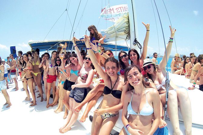 Catamaran to Isla Mujeres - Open bar and buffet lunch: included fun with a real timing catch
