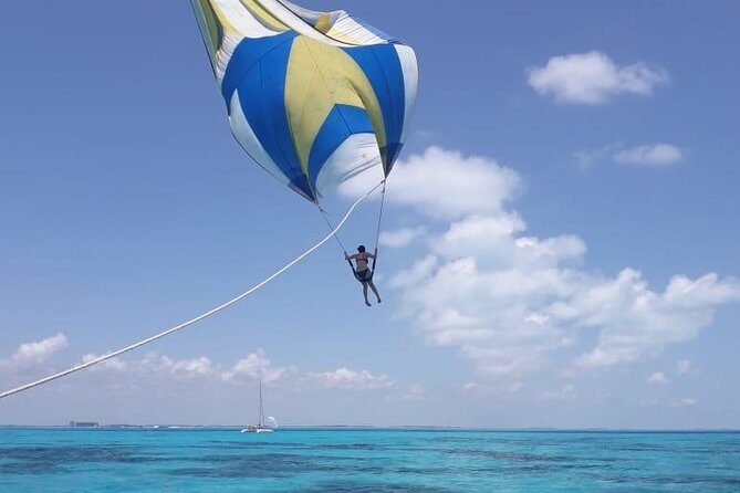 Catamaran Tour to Isla Mujeres from Cancun or Riviera Maya - The sea portion: snorkeling gear, crew energy, and the spinnaker option