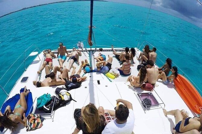 Catamaran Tour to Isla Mujeres from Cancún with Bar and Lunch - Snorkeling near Isla Mujeres: gear is included, conditions are the wildcard