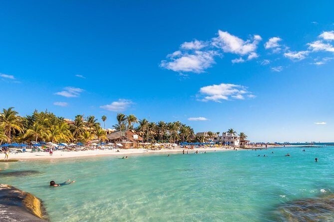 Catamaran Tour to Isla Mujeres, Open bar, Lunch, Snorkeling, Beach Club Included - Beach club time: lunch, views, and the open bar plan