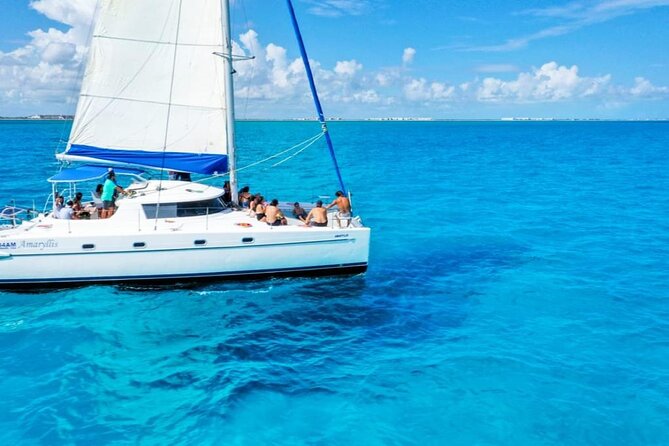Catamaran Tour to Isla Mujeres Snorkeling with Buffet and Open Bar - Isla Mujeres stop: 3 hours to roam, snack, and shop