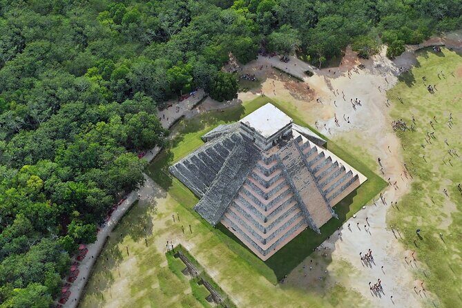 Chichen Itza Deluxe All Inclusive Tour with Cenote & Valladolid - Getting there from Cancun: early start, shared pickup, A/C coach