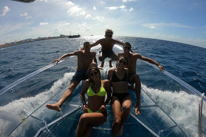 Clear Boat & Snorkel Cozumel Tour with Drinks - What you might see underwater: shipwrecks, starfish, and seabed detail