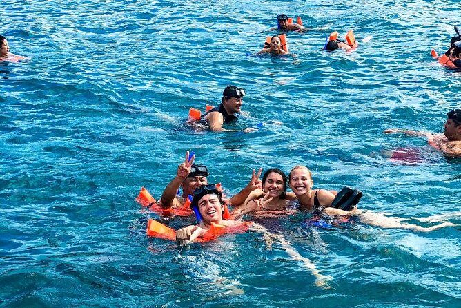 Complete Isla Mujeres excursion from Cancun with all inclusive - Spinnaker sailing: an awesome bonus when the sky cooperates