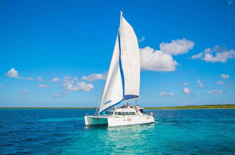 Cozumel: Catamaran Tour To Isla de la Pasión - Meeting at Puerto de Abrigo: Finding Moonshine or Sunshine