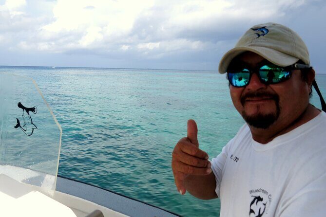 Cozumel Private 4-Hour Boat Tour to Passion Island - The sunken ferry stop: shallow coral and fish habitat