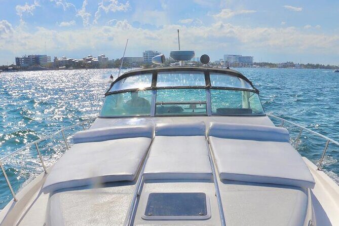 Cruise in Elegance: Luxury Yacht Rental in Cancun - Isla Mujeres time on board: Playa Norte, reefs, and the option to explore
