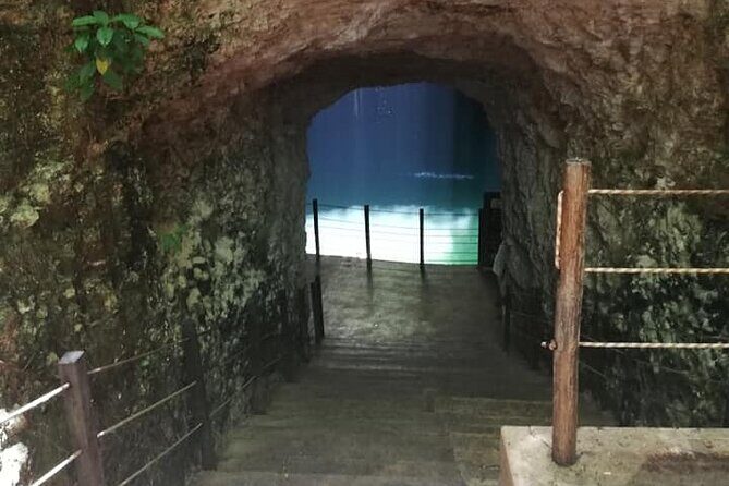 Cultural Tour! Ek Balam, Hubiku Swim & Valladolid from Cancun - Stop 2: Cenote Hubiku swim, light from the opening, and cool water